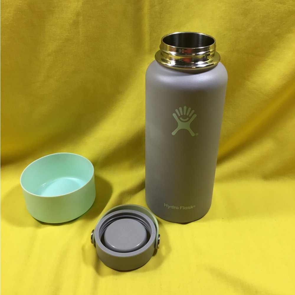 Hydro Flask Light Gray Bottle with Mint Green Cup holder